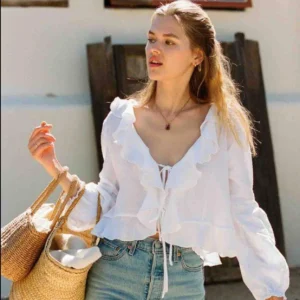 Blusa con volantes Oversize